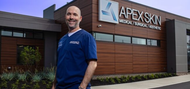 Dr. Garcia outside Apex Skin Dermatology Office in Mayfield Heights Ohio.