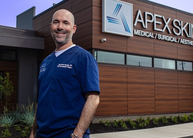 Dr. Garcia outside Apex Skin Dermatology Office in Mayfield Heights Ohio.